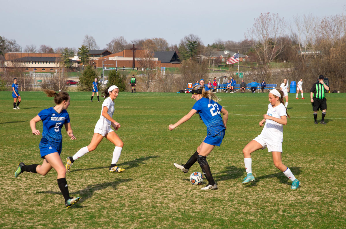 girls-playing-soccer
